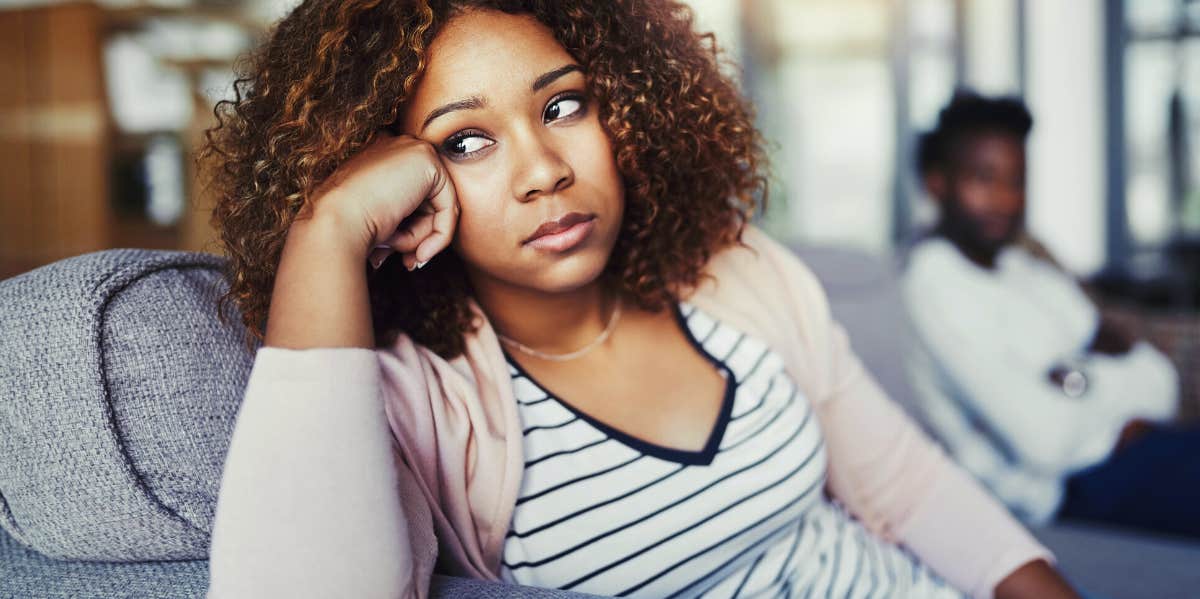 Early relationship problems to watch out for Woman having issues with man