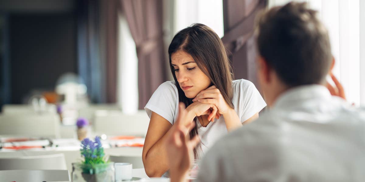 man and woman in tense moment