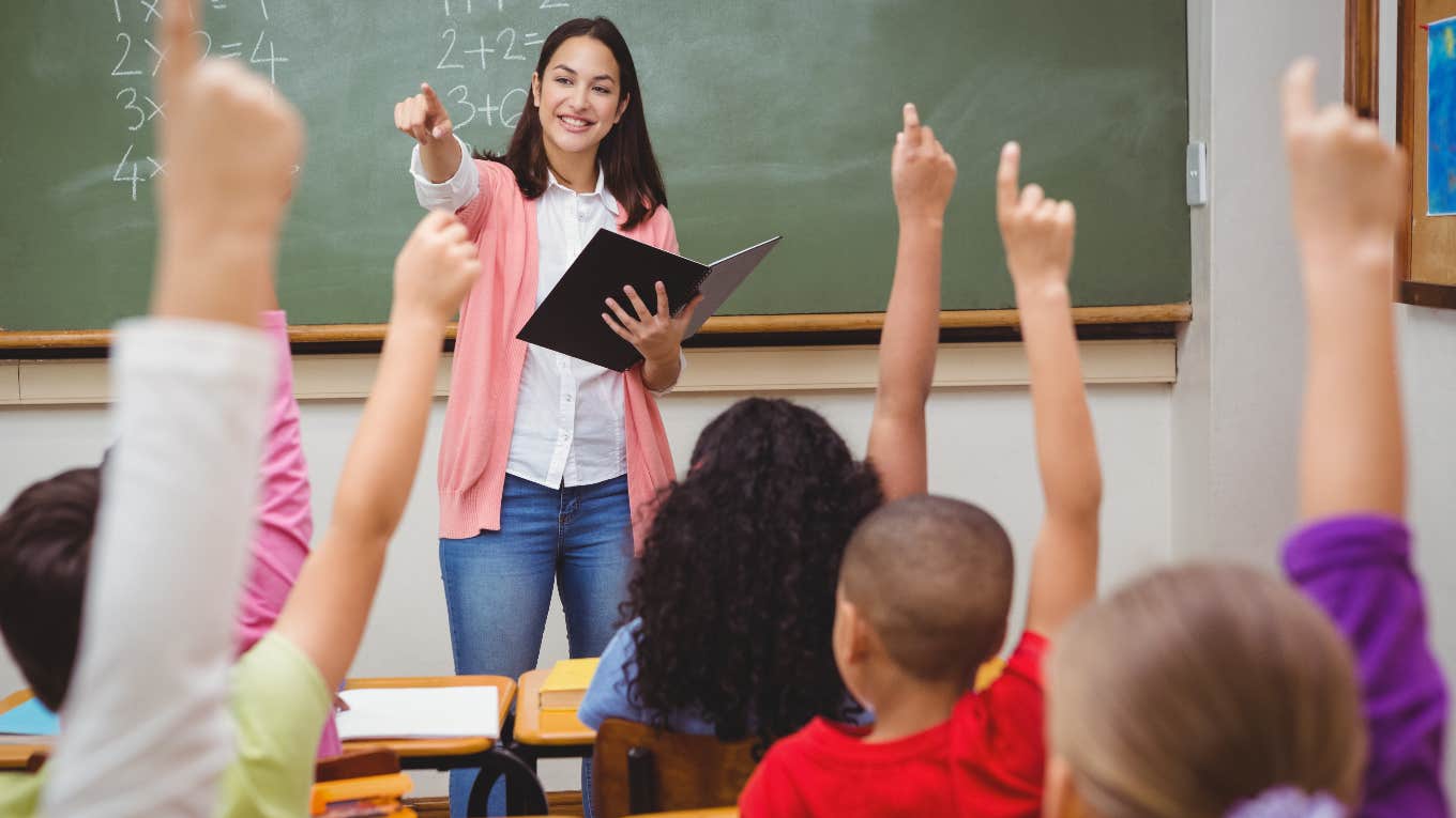 teacher in classroom wearing jeans