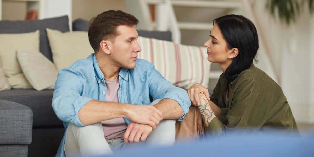 man and woman talking to each other