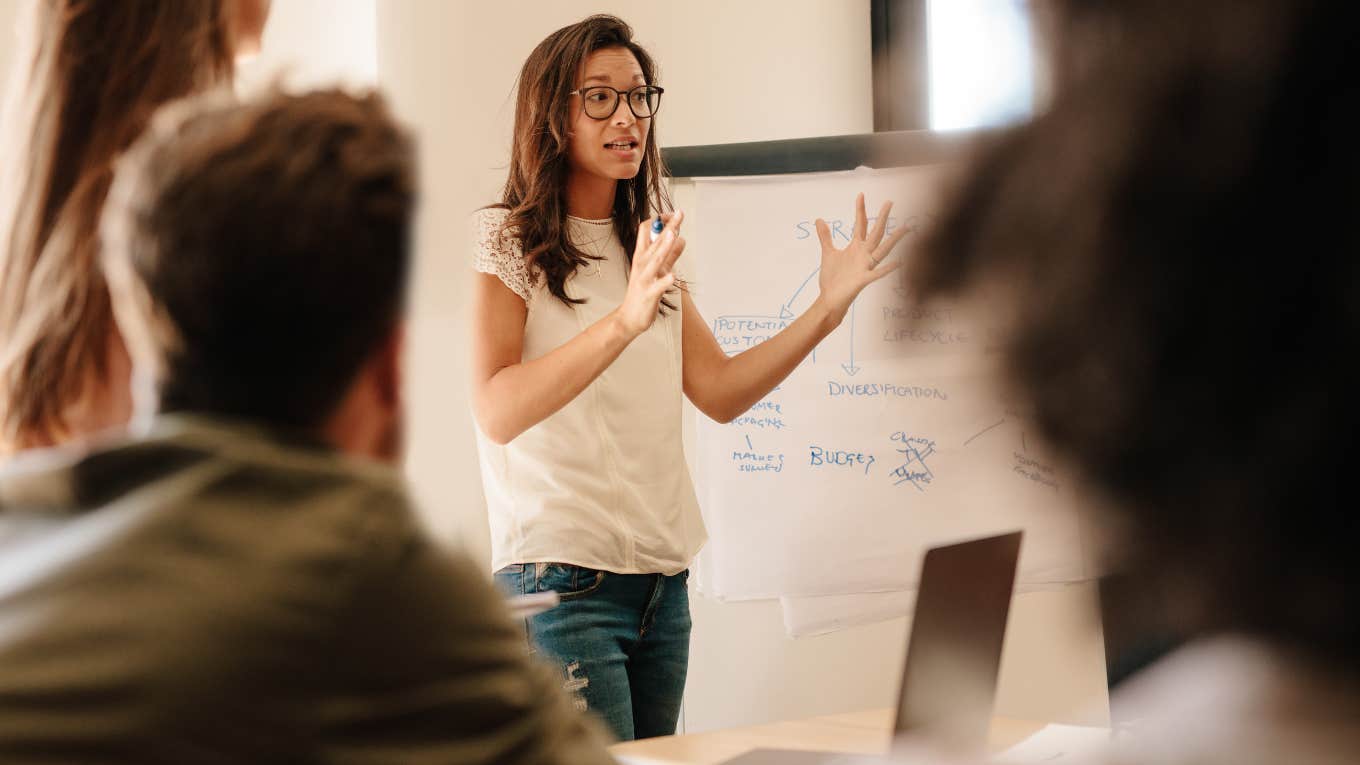 Girl taking charge of a meeting 