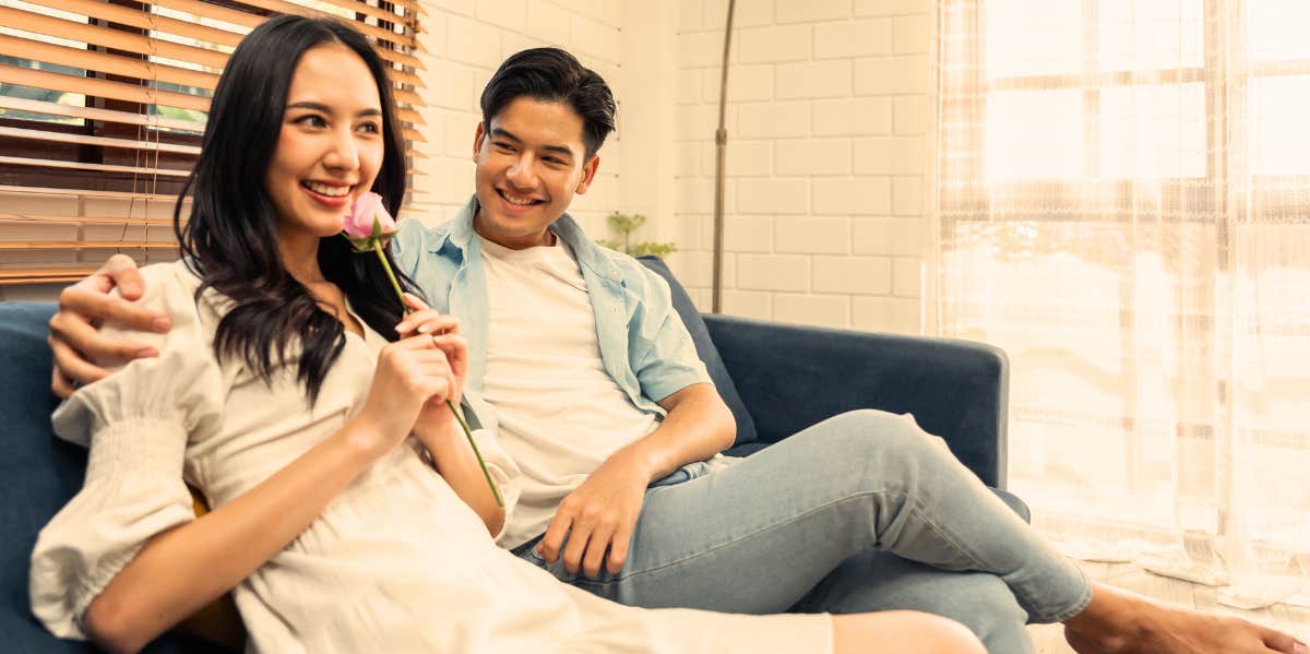 man and woman on couch