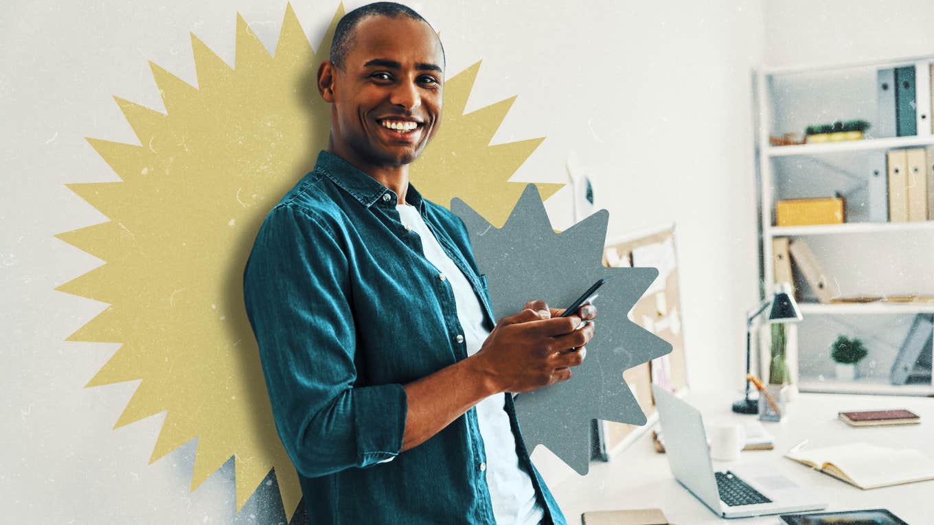 Man leaning against wall, smiling, nice guy