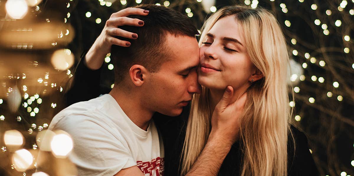 What Is Emotional Agility — And Why It Severely Impacts Your Relationship woman grasping top of man's head