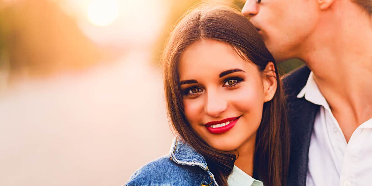 Emotional attachment Smiling woman close to man