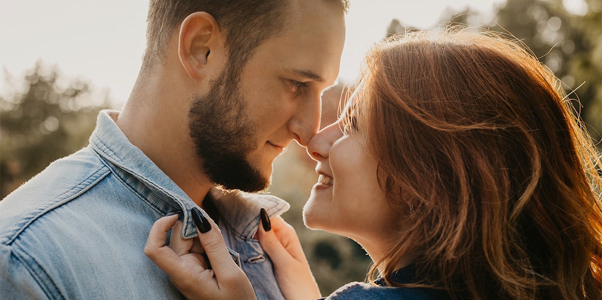 woman and man looking at each other 