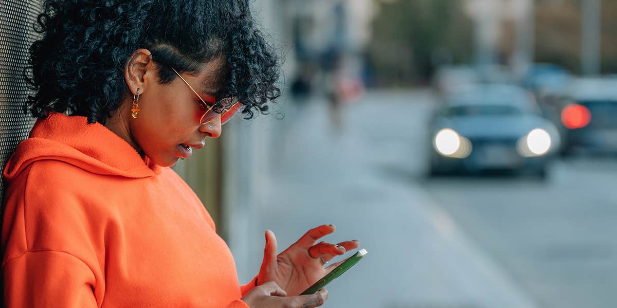 The Newest Way People Are Using Facebook To Cheat On Their Partners woman texting