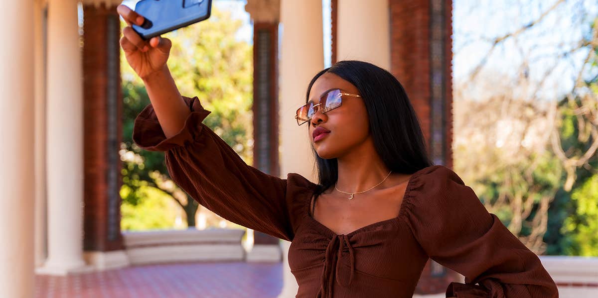 woman taking selfie