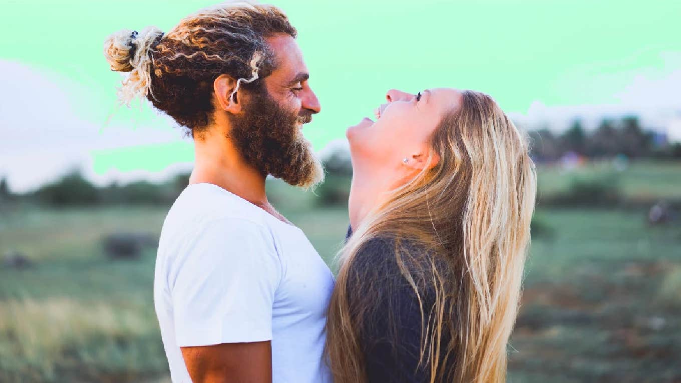 woman laughing with man who is emotionally immature