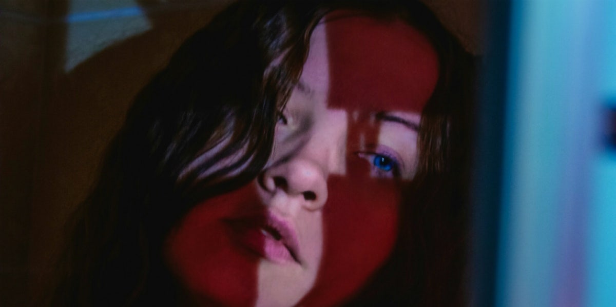 9 Signs You’re Too Emotionally Needy & How To Stop sad woman in the dark