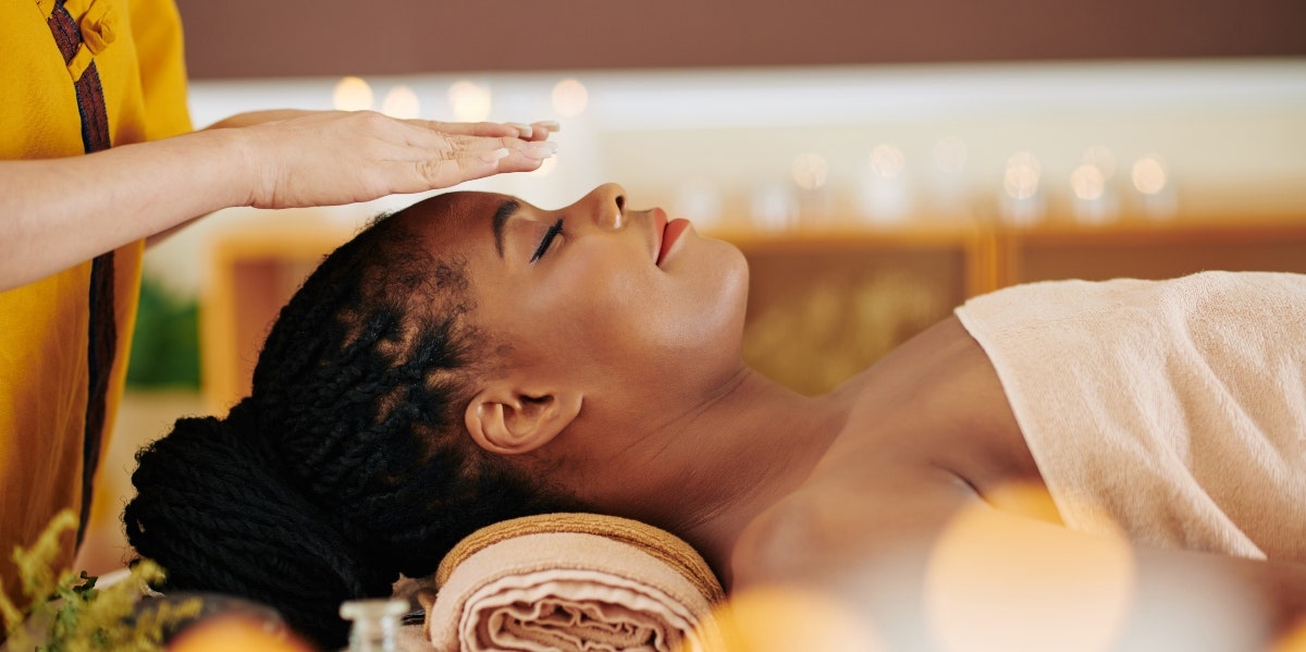 woman receiving Reiki energy healing