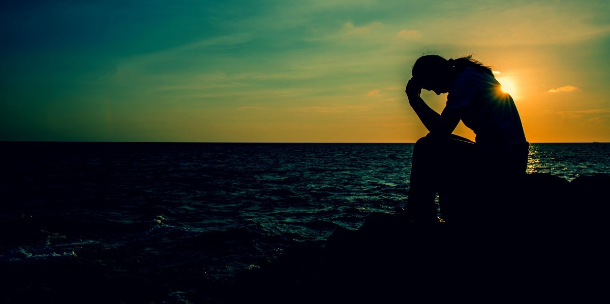 energy shift silhouette of a woman at sunset