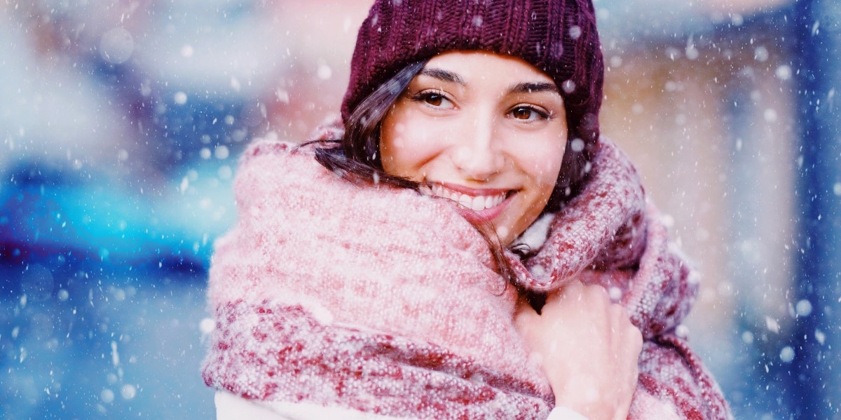 happy woman in the snow