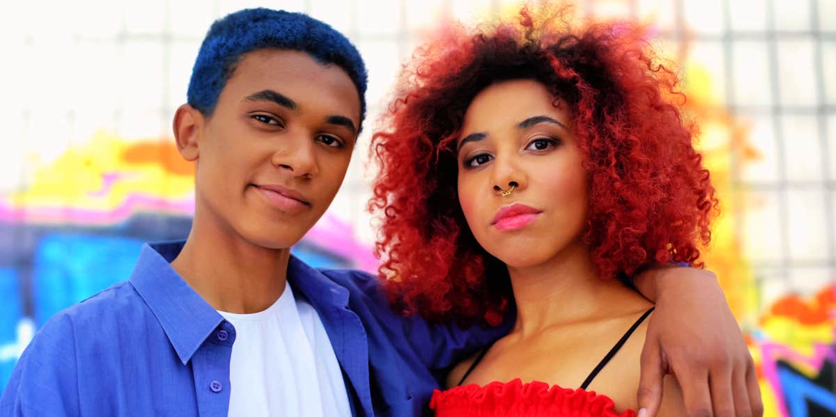 young couple posing at carnival