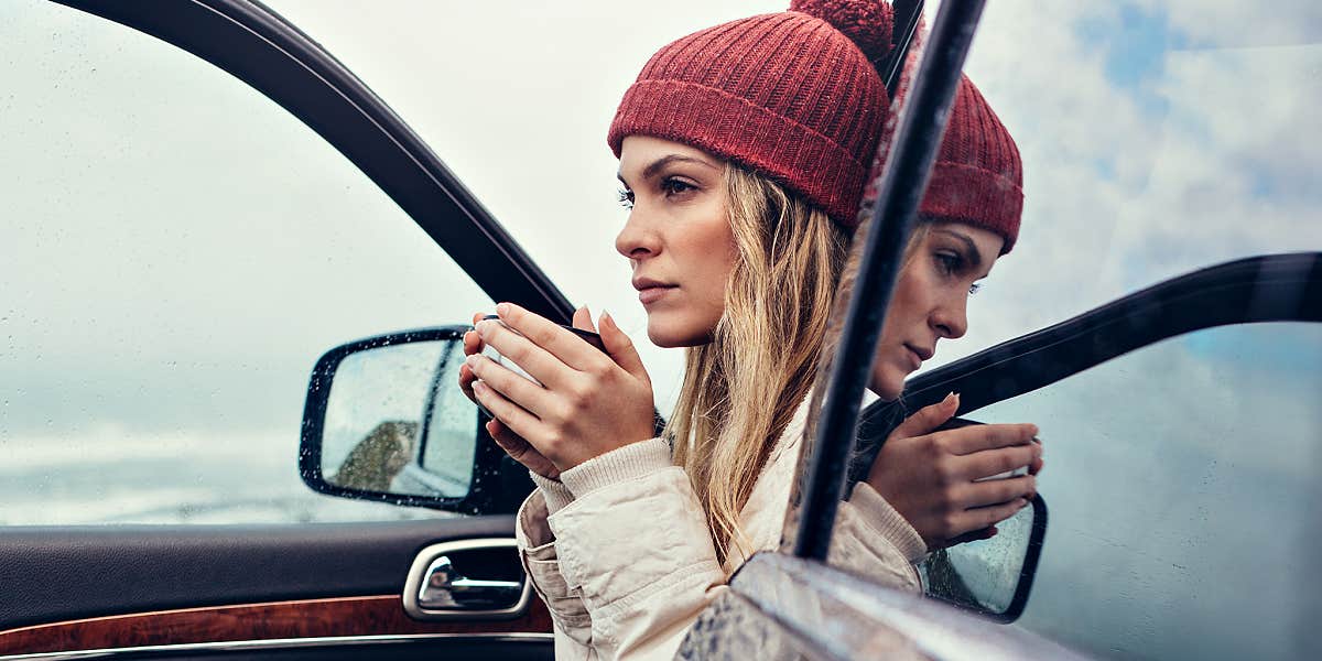 woman sitting in car 