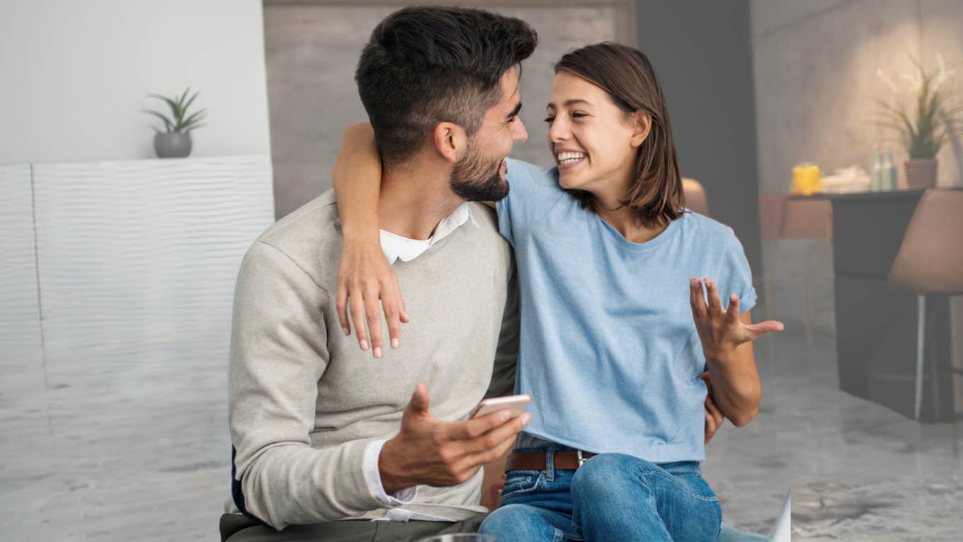 Couple relaxing in their home. 