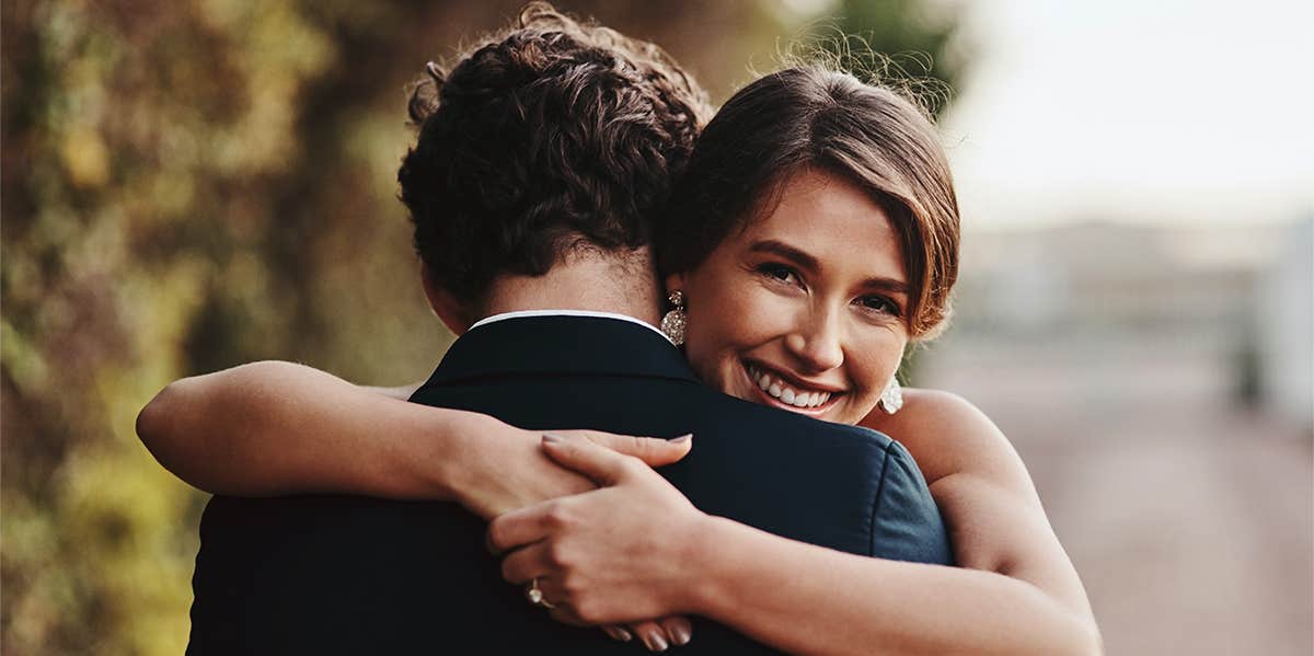 bride hugging groom