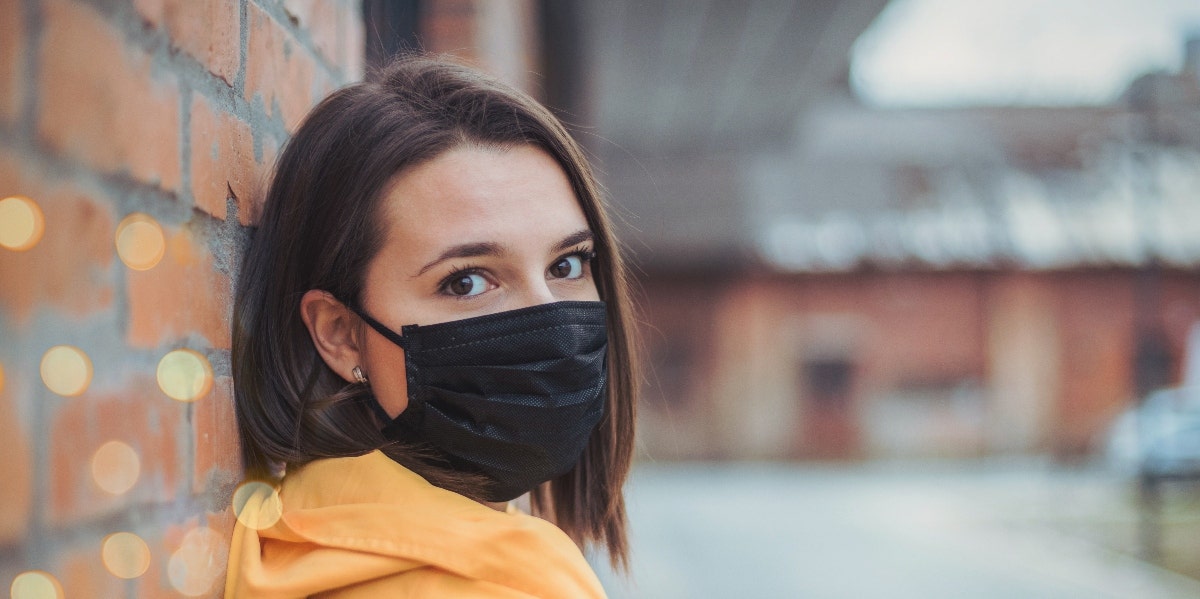 woman wearing mask outside