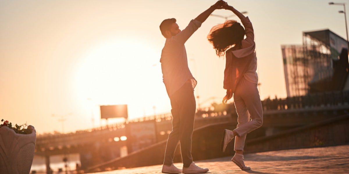 couple dancing in sunlight