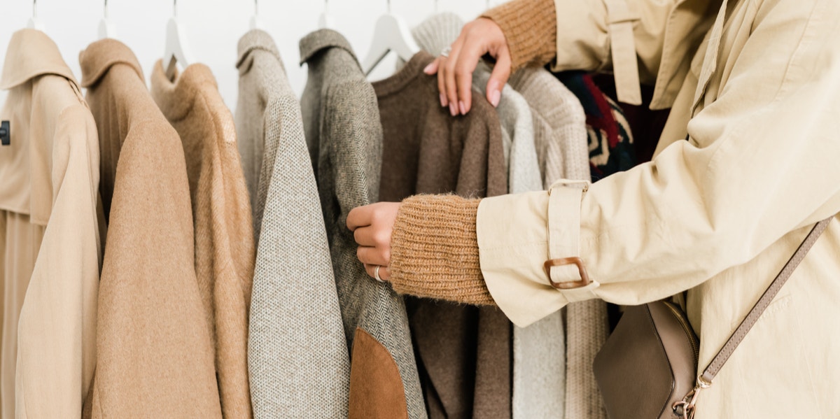 woman in trench coat shopping