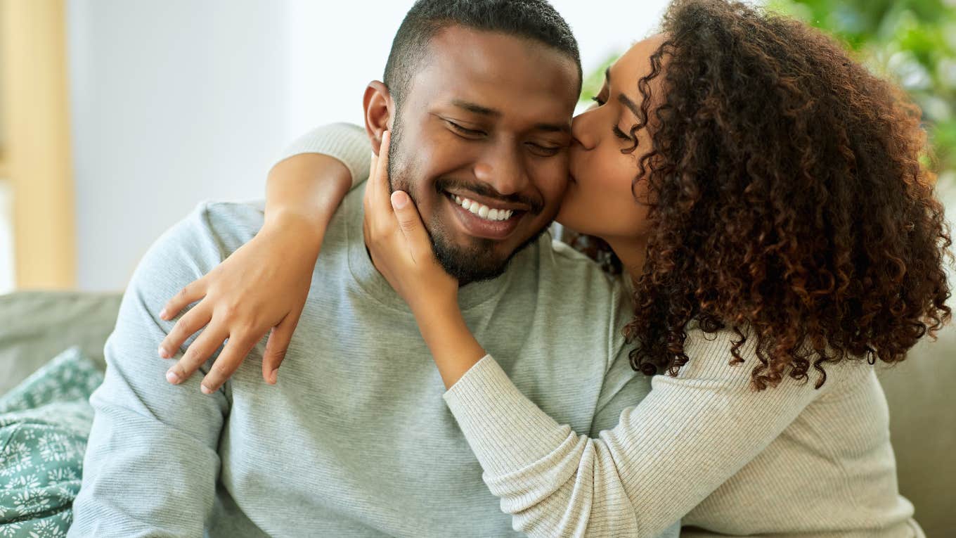 The Ironic Reason You Feel Like You'll Never Fall In Love couple on couch