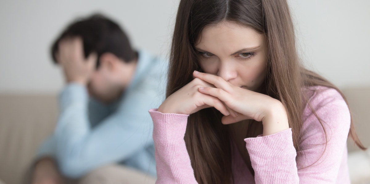 7 Subtle Signs You're In Love With A Misogynistic Man woman and man stand-off