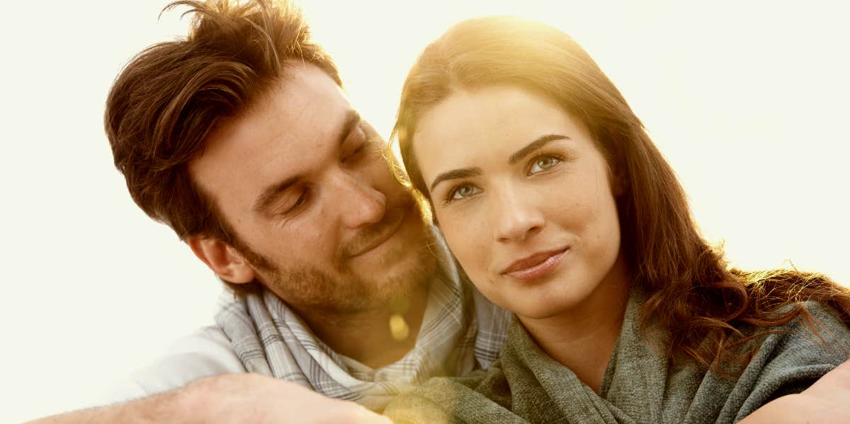 Couple in love sitting together