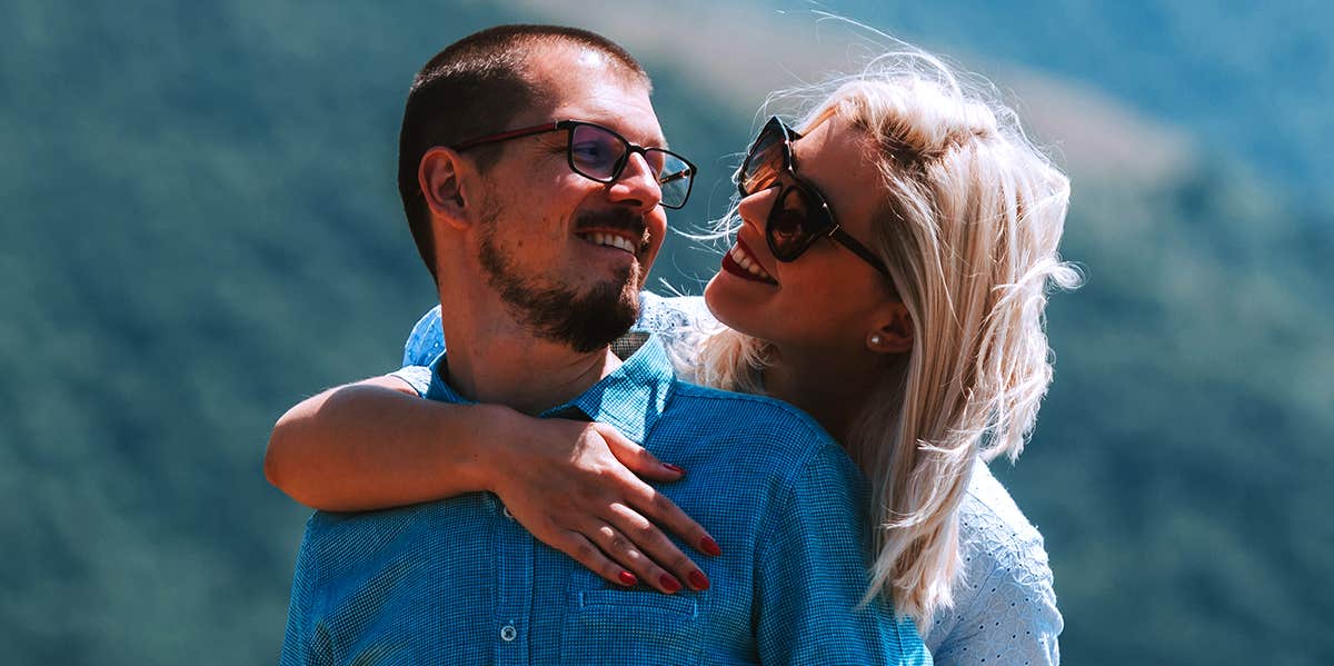 Reasons Geeks Make The Best Husbands woman hugging man from behind