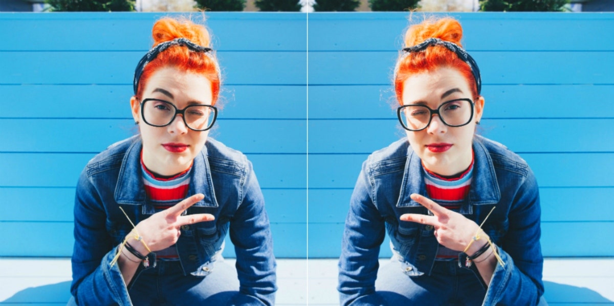 What Does 'Fam' Mean? The Meaning Of The Slang Internet Term woman holding up a peace sign
