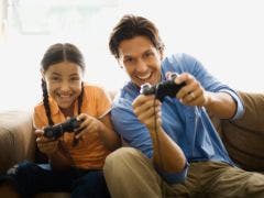 father and daughter playing video games