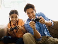 Parenting Conflict? Make Sure Your Kid Wins father and daughter playing video games