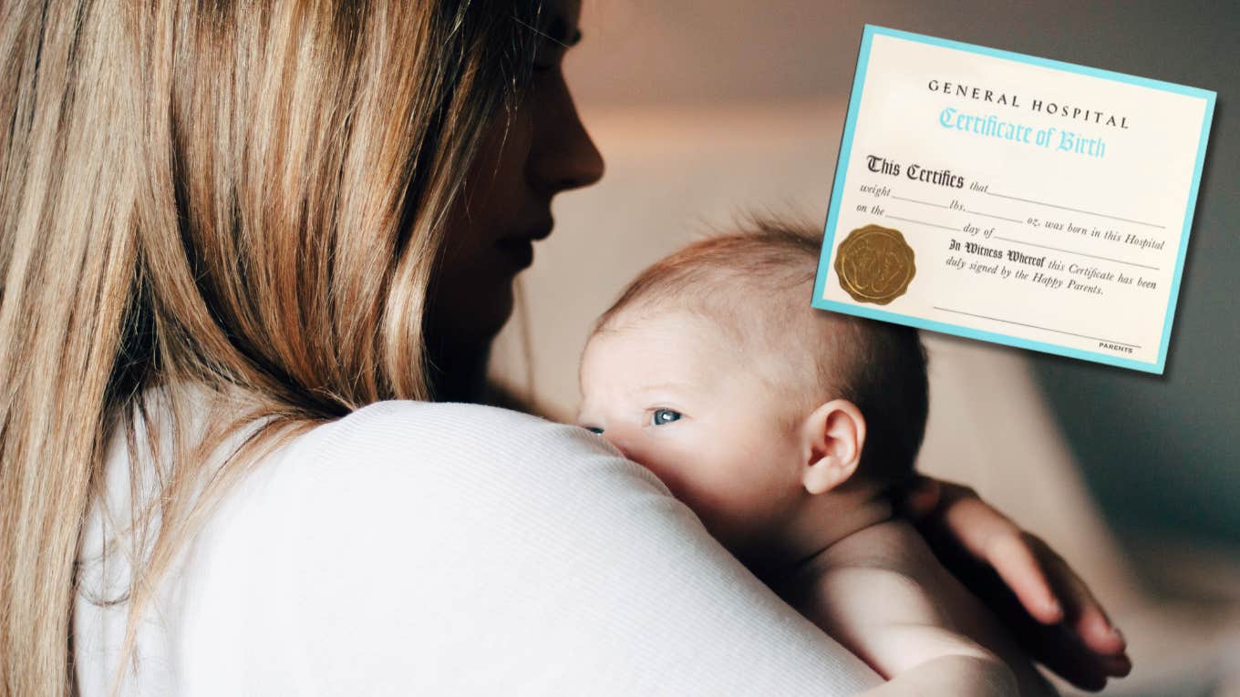 woman holding baby and birth certificate