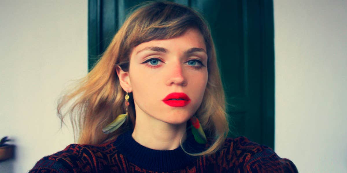 blonde woman wearing bright lipstick