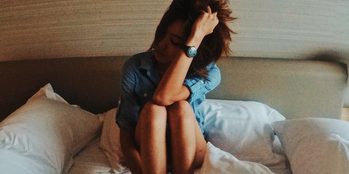 feeling sad all the time sad woman in bed