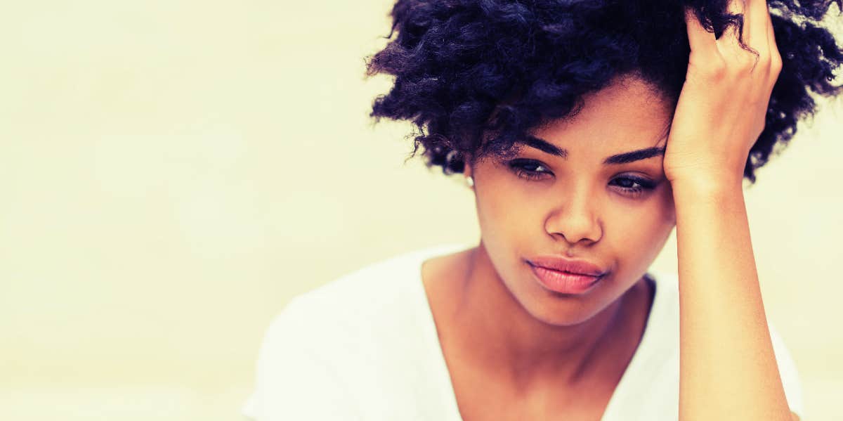 7 Reasons Women Feel Unwanted In Relationships & What To Do About It sad woman feeling unwanted in a relationship