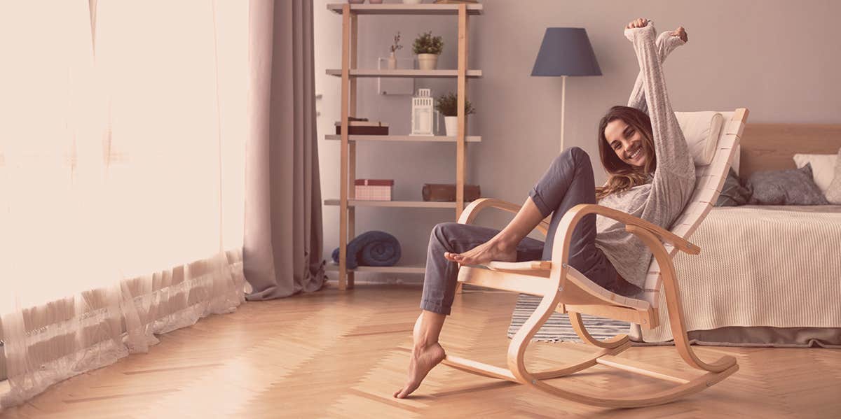 woman relaxing in chair at home