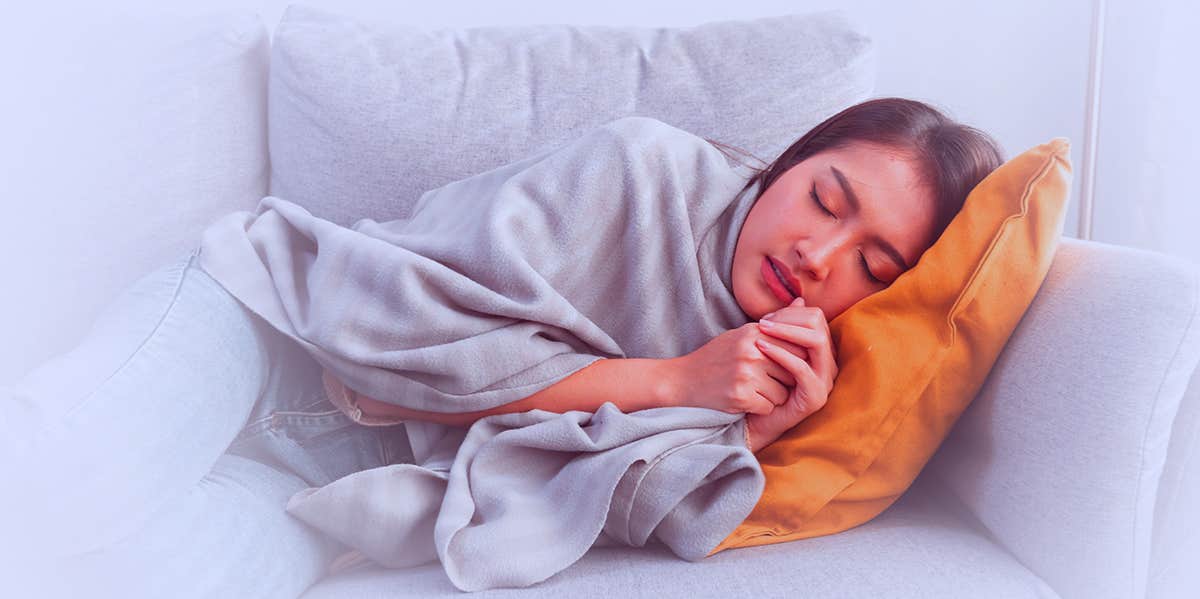 woman sleeping on couch