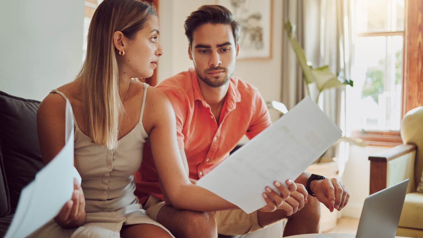 man and woman having a dispute over finance