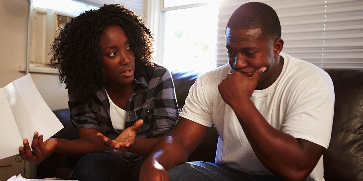 Keeping This Secret From Your Spouse Is Even Worse Than Cheating couple arguing over finances