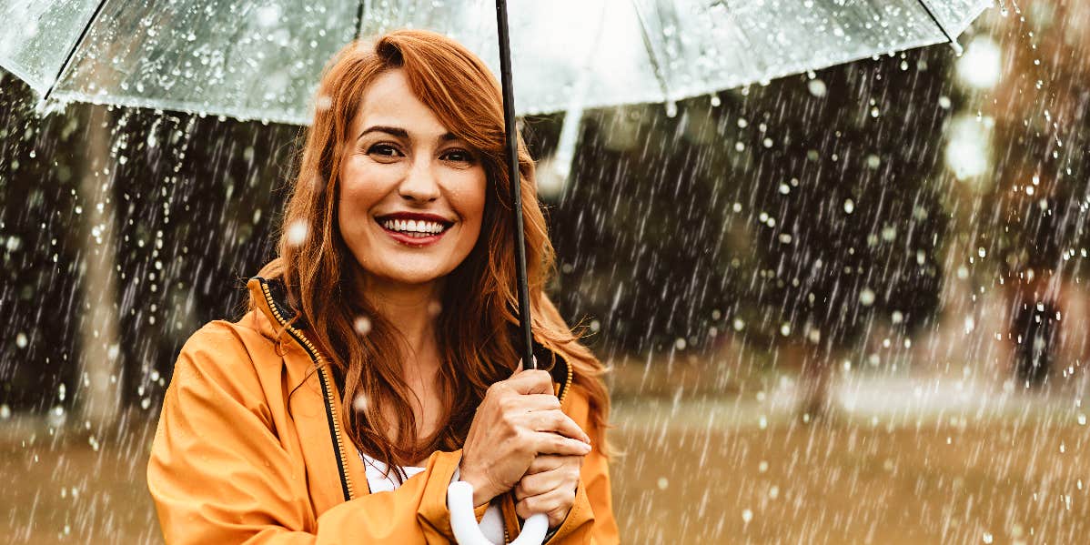 Woman smiling in the rain