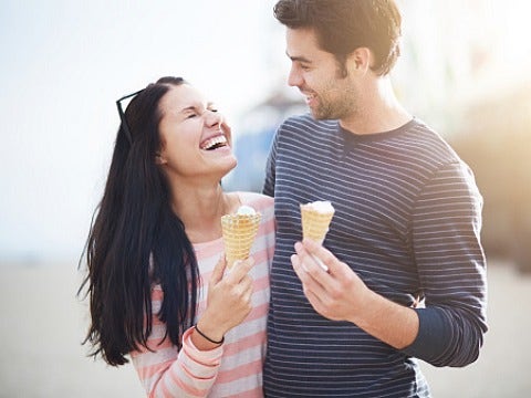 couple talking on beach