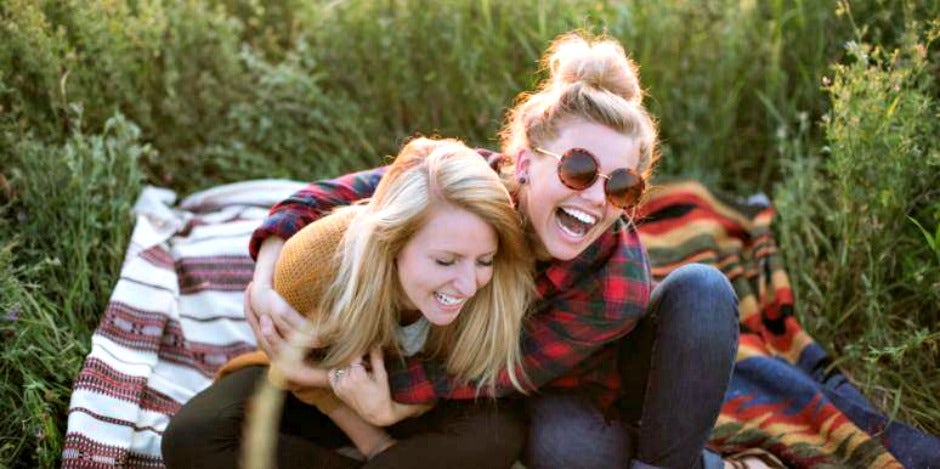 The Unexpected Way Birth Order Affects Your Weight, According To Science sisters hugging