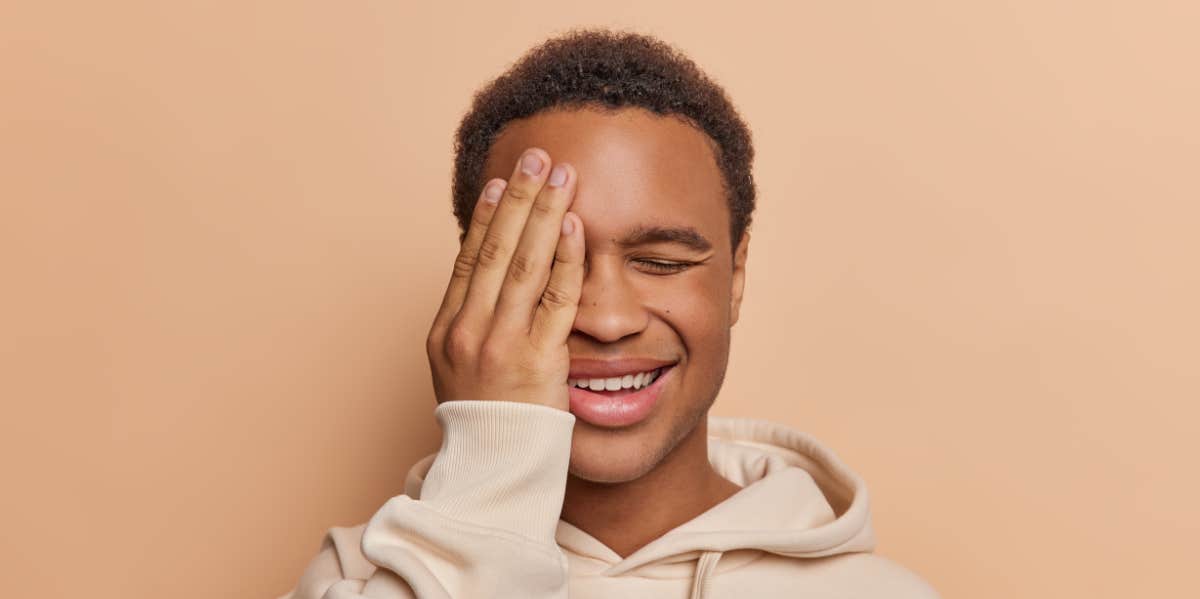 5 Things You Can Tell About A Man Just By Looking At His Fingers man covering his eyes