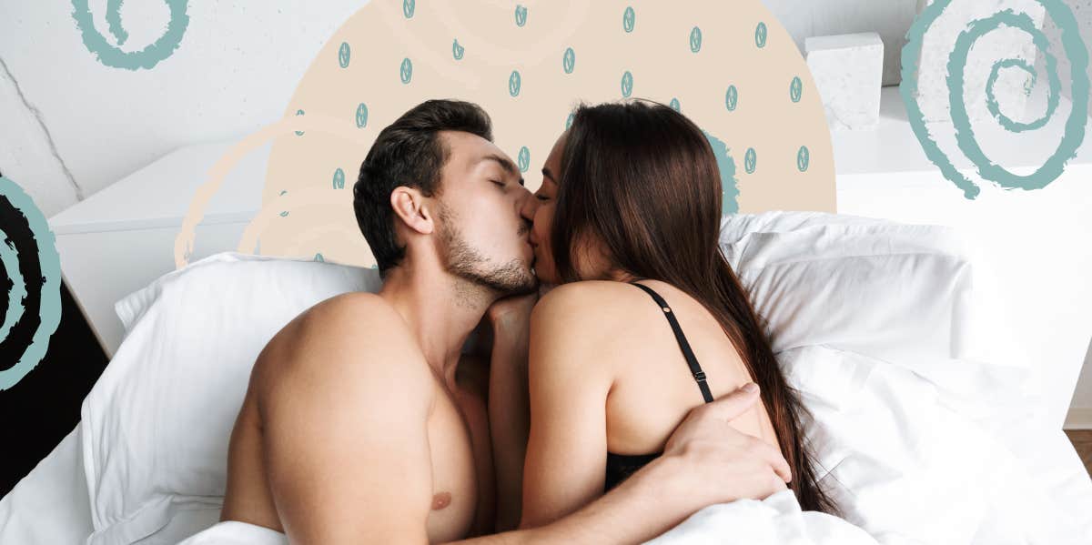 Couple kissing in bed