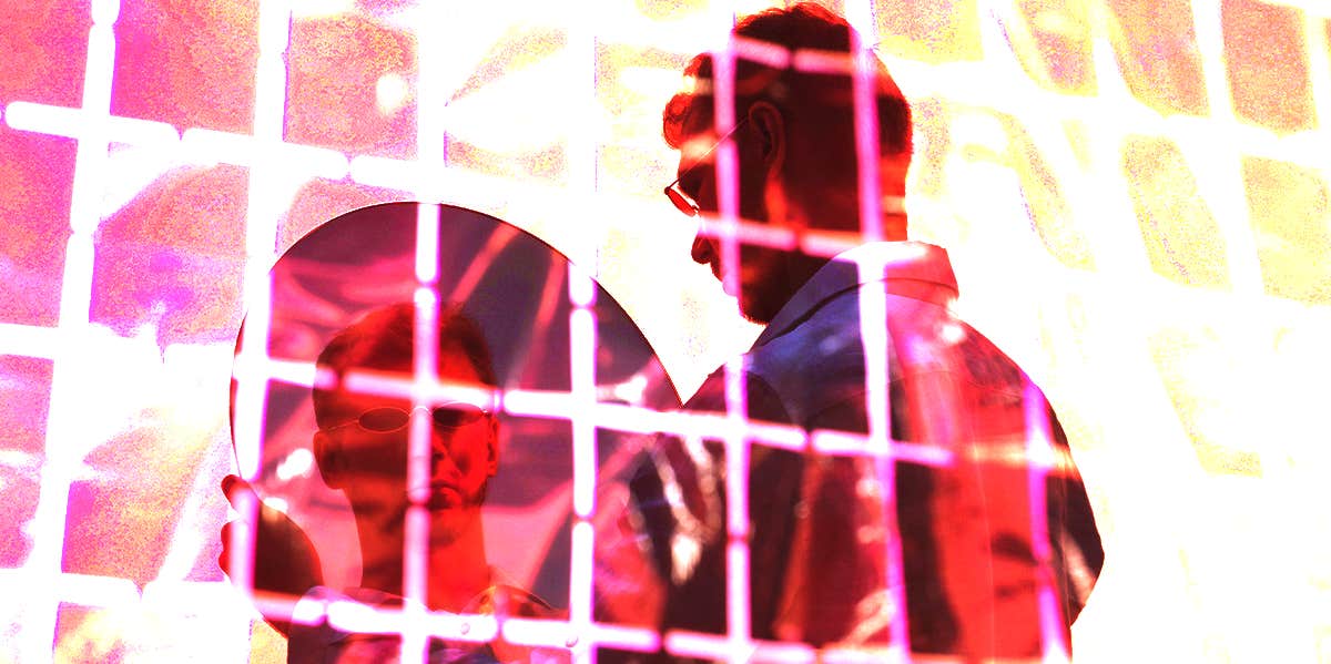 Things To Ask Yourself To Be A Better Partner man looking in mirror