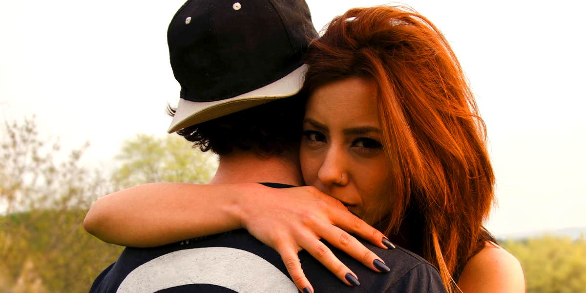 Ways Being Friends With Your Ex Can Ruin You woman hugging man