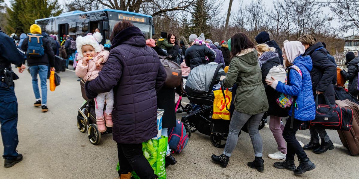I Fled Ukraine To Save My 3-Year-Old Daughter. We Want To Go Home. ukranians fleeing