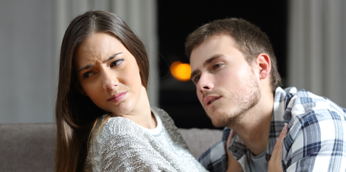 a forced kiss woman pushing him away