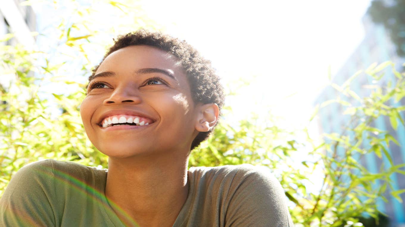 4 Psychological Signs You're On The Right Path woman smiling