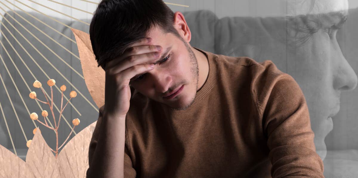 Depressed man sitting on couch